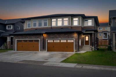 247 Kinniburgh Rd, Home with 3 bedrooms, 2 bathrooms and 4 parking in Chestermere AB | Image 1