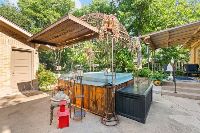 View of patio with a hot tub | Image 31