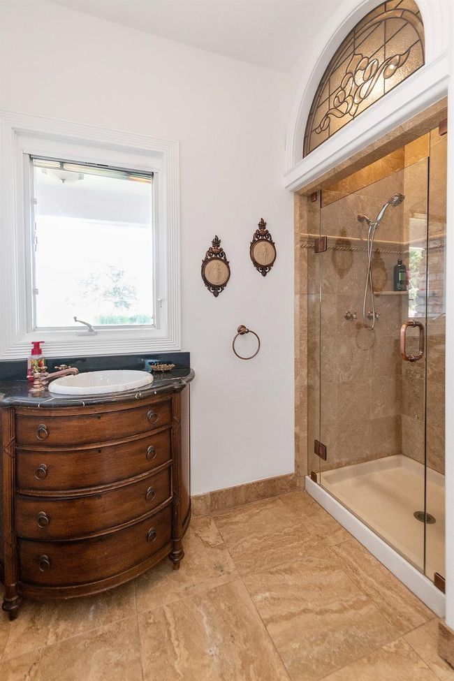 Downstairs third full bath. | Image 44