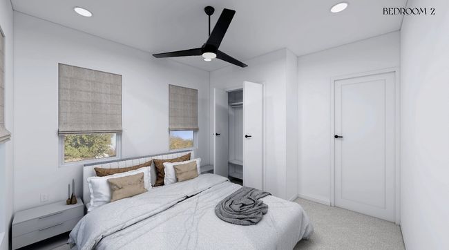 Bedroom with a ceiling fan, light colored carpet, and recessed lighting | Image 9