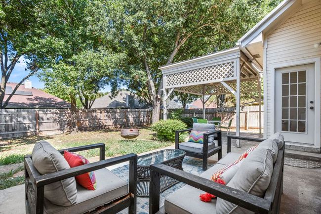 Fenced backyard with outdoor lounge area and a patio area | Image 27