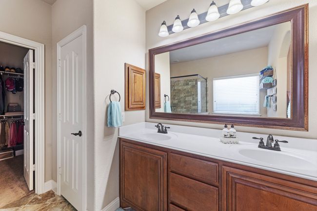 Bathroom with a stall shower and a garden tub | Image 15