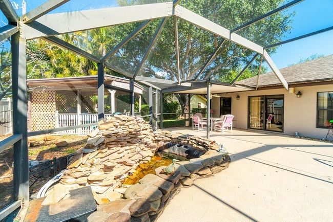 61 W Rubber Tree Dr, House other with 3 bedrooms, 2 bathrooms and null parking in Lake Worth FL | Image 26