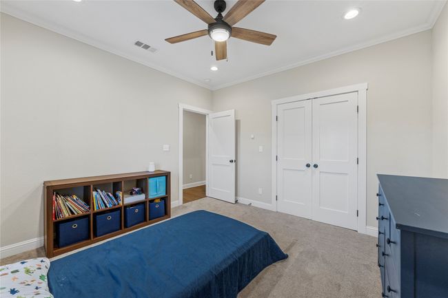 Bedroom with recessed lighting, visible vents, baseboards, and crown molding | Image 17