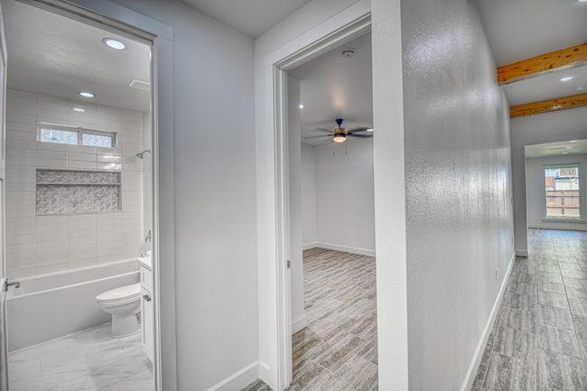 Hall with light wood-type flooring | Image 6