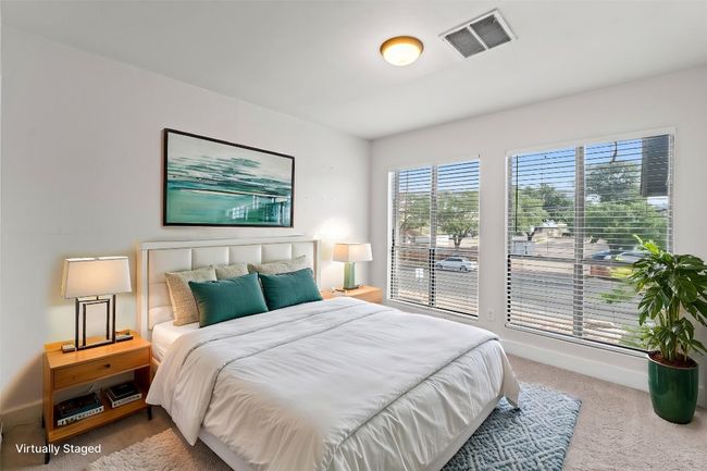 Bedroom with carpet and baseboards | Image 7