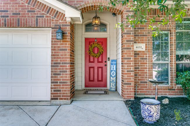 Your guests will thank you for the covered porch for the days it is raining. | Image 4