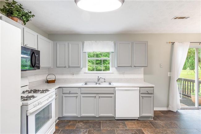 7108 Hummingbird Ln, House other with 5 bedrooms, 2 bathrooms and null parking in Winston GA | Image 8