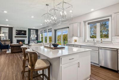 (*Photo of decorated model, actual homes colors and finishes will vary) An open concept throughout, enjoy this thoughtfully designed kitchen | Image 2