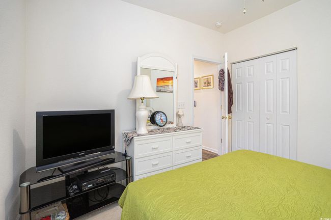 Bedroom with a closet | Image 17