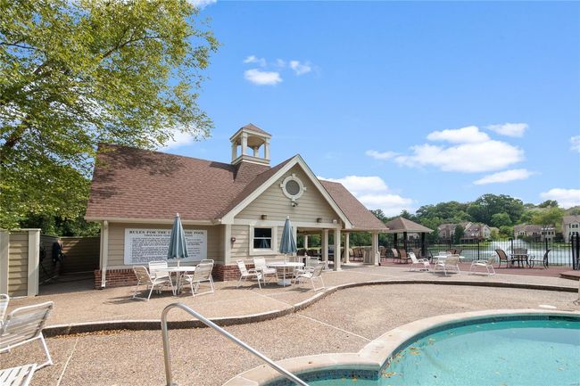 Community pool featuring a patio and gazebo | Image 71