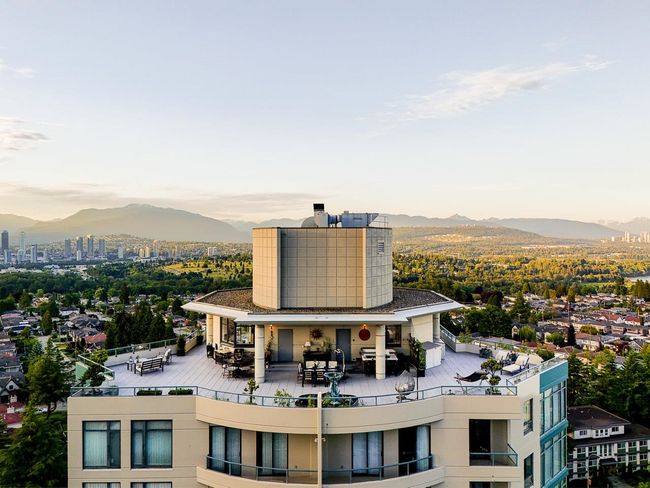 Back of property at dusk featuring a mountain view and a chimney | Image 5