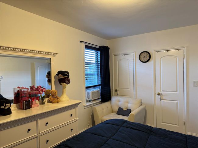 Bedroom featuring cooling unit | Image 5