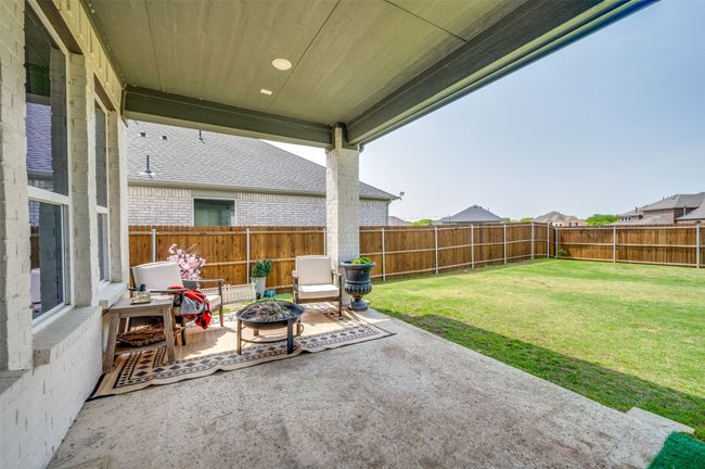 View of patio / terrace featuring a fenced backyard and an outdoor fire pit | Image 33