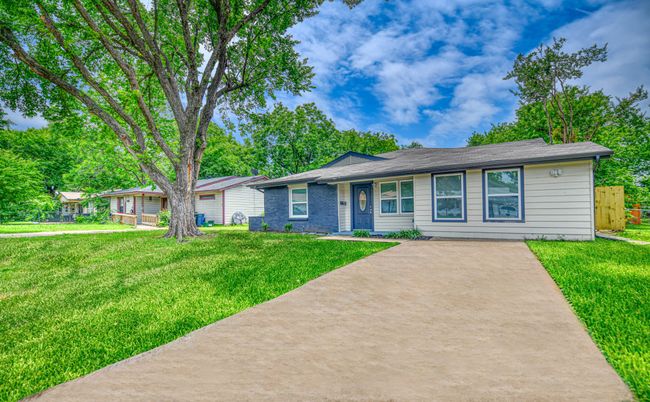Single story home with a front yard | Image 27