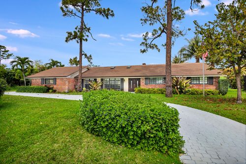 320 N Country Club Dr, Atlantis, FL, 33462-1002 | Card Image