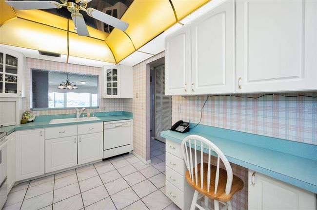 Kitchen with loads of cupboards | Image 25