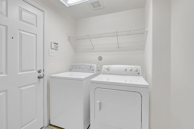 Indoor laundry room (washer and dryer stay with the home). | Image 27