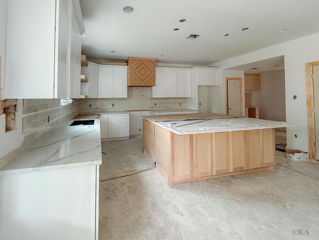 Ample cabinetry for all of your culinary gadgets and plateware. | Image 13