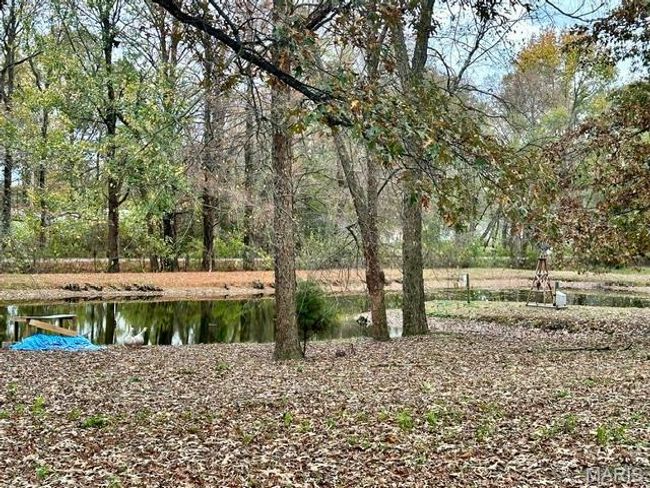 View of yard featuring a water view | Image 5