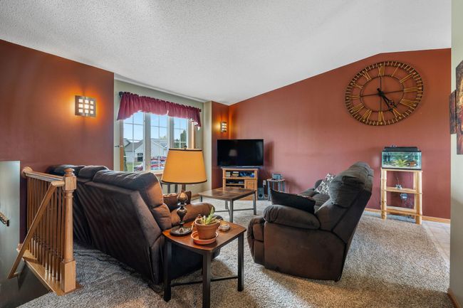 908 24th Ave NW - spacious living room has a large window | Image 4
