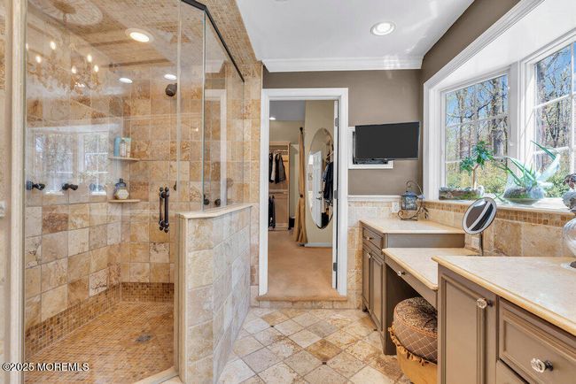 Primary Bathroom leading to massive walk-in closet | Image 57