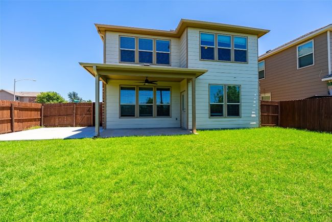 Back of house featuring a patio area, ceiling fan, and a fenced backyard | Image 25
