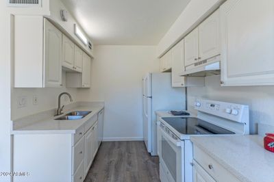 Kitchen with new quartz countertops | Image 3