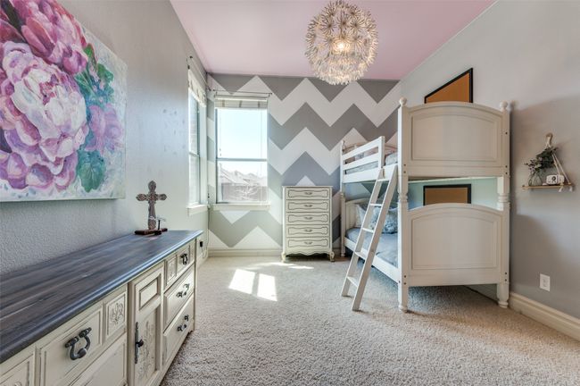Carpeted bedroom with baseboards | Image 31