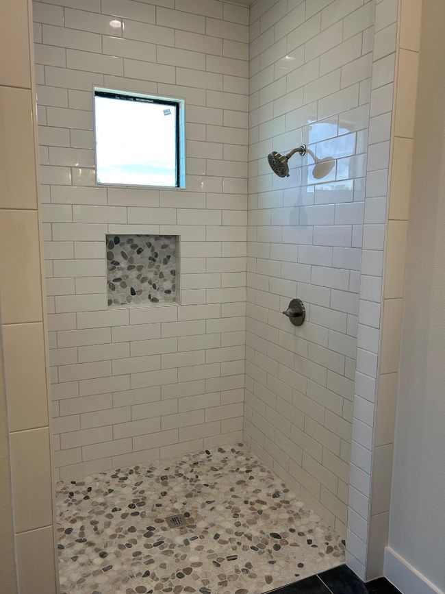 Bathroom featuring tiled shower | Image 16