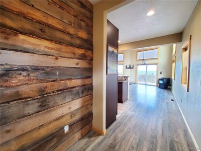 Rustic wood wall at entry | Image 2