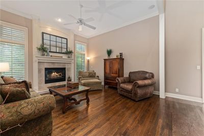 View of front of home featuring a front lawn and a garage | Image 3