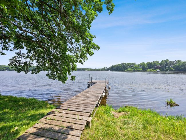 You'll find a private dock and a firepit perfect for enjoying lakefront evenings. | Image 15