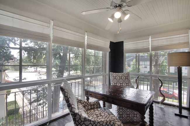 Sunroom with a ceiling fan | Image 26
