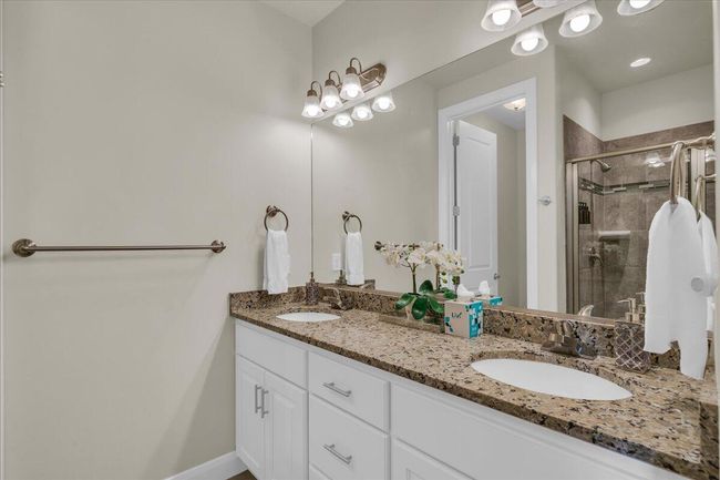 27-Dual Sinks, Wrap Around Shower | Image 25