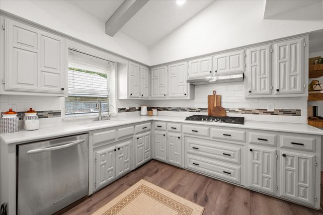 Kitchen includes a gas stove. | Image 17