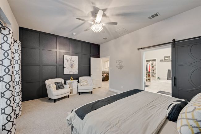 Primary bedroom with accent wall | Image 15