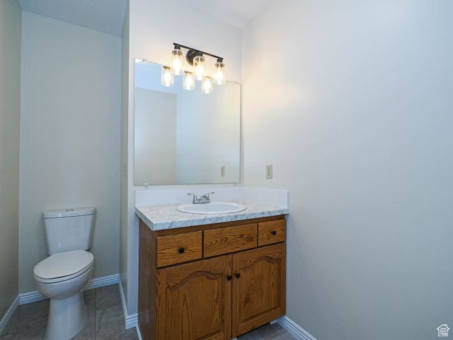 Bathroom featuring vanity and toilet | Image 37