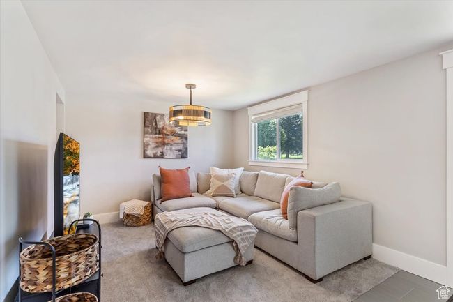 Living area featuring baseboards | Image 9