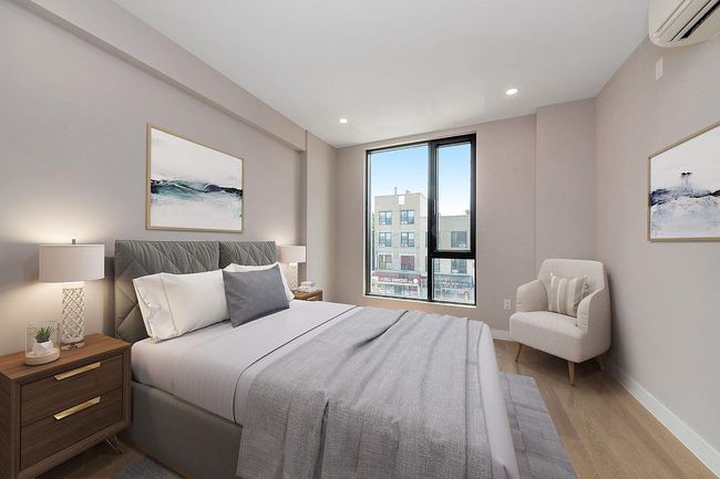 Bedroom featuring dark wood finished floors and recessed lighting | Image 7