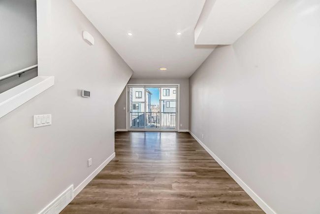 207 Evanscrest Square Nw, Townhouse with 2 bedrooms, 3 bathrooms and 1 parking in Calgary AB | Image 8