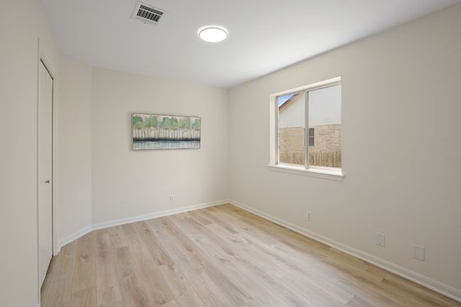 Bedroom 2 and 3 are located in another wing of the home | Image 16