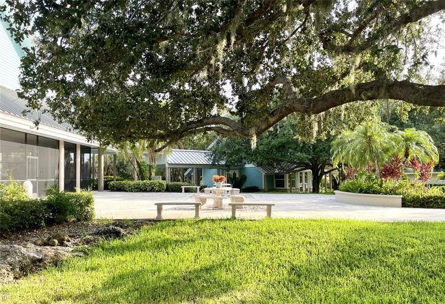 Open air patio overlooking pond. Catch and release fishing is permitted. | Image 59