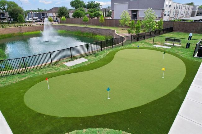 Community putting green. | Image 30