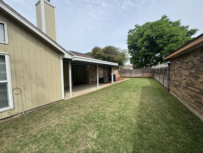 View of yard featuring a patio area | Image 28