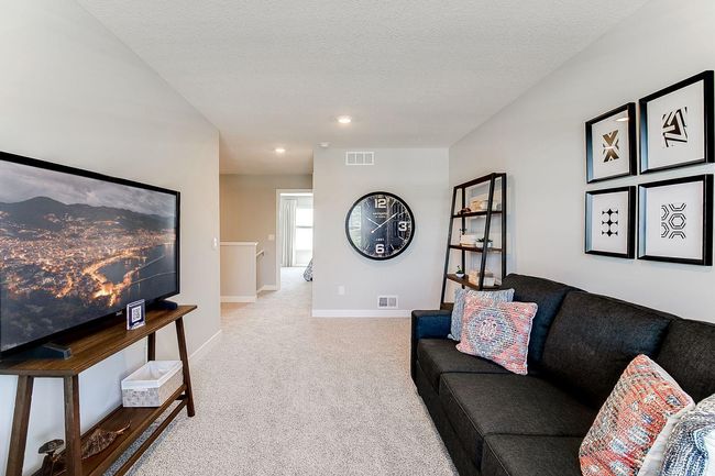 Perfectly designed and functional living areas. Photo of model home, color & options may vary. | Image 14