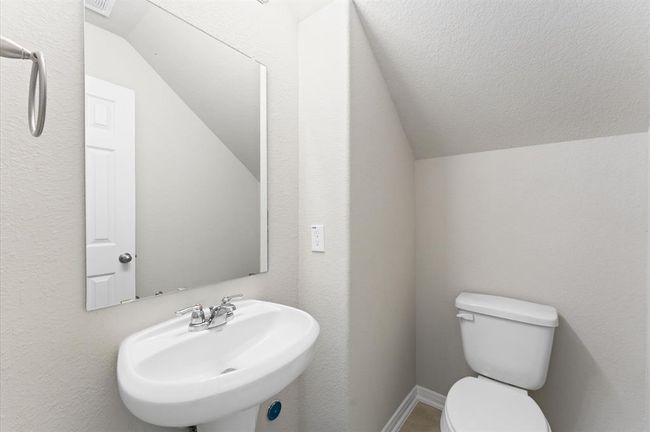 private half bath | Image 11