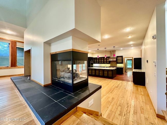family room to kitchen | Image 17