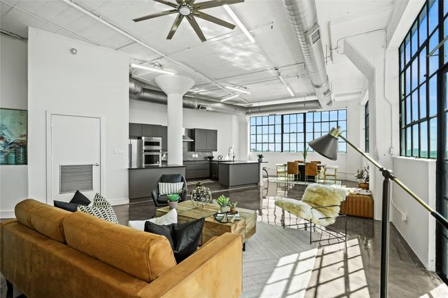 Living area featuring ceiling fan | Image 13