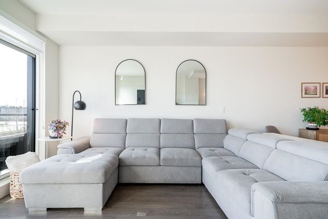 Living area featuring dark wood-style floors | Image 14
